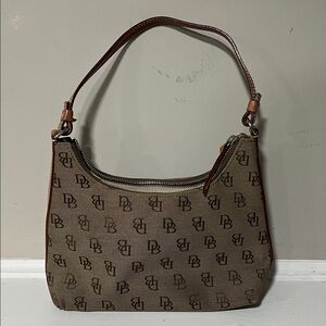 Dooney & Bourke cloth with leather strap and trim small hobo bag brown used
